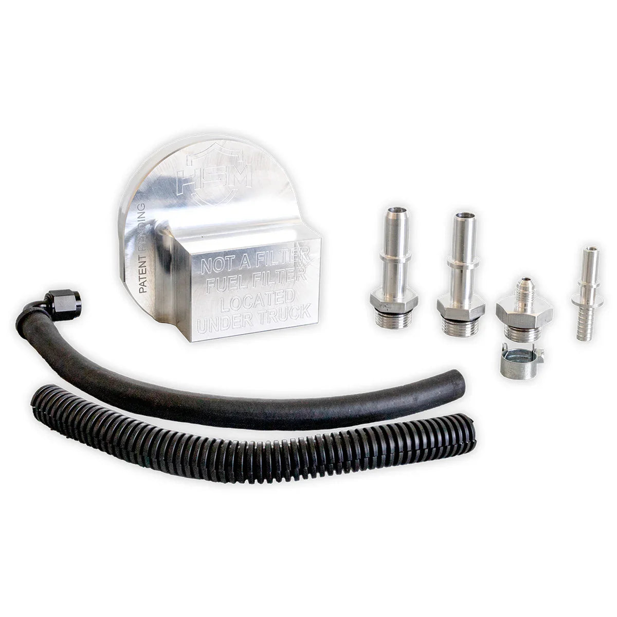 Complete 2017–2025 Ford 6.7L Power Stroke Upper Fuel Filter Bypass Kit with billet aluminum block, hose, fittings, and connectors.