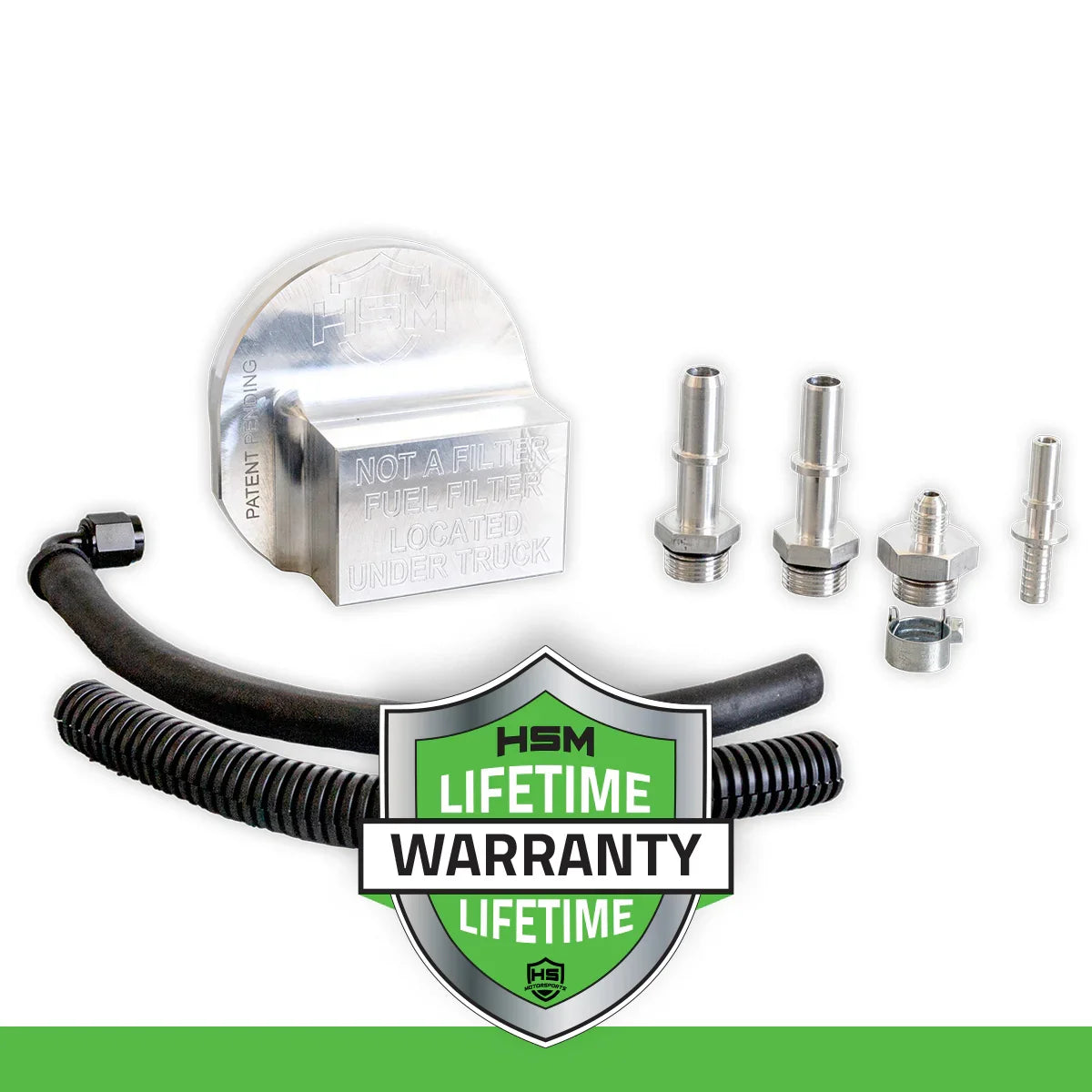 2017–2025 Ford 6.7L Power Stroke Upper Fuel Filter Bypass Kit with lifetime warranty badge, showing billet block, hose, and fittings.