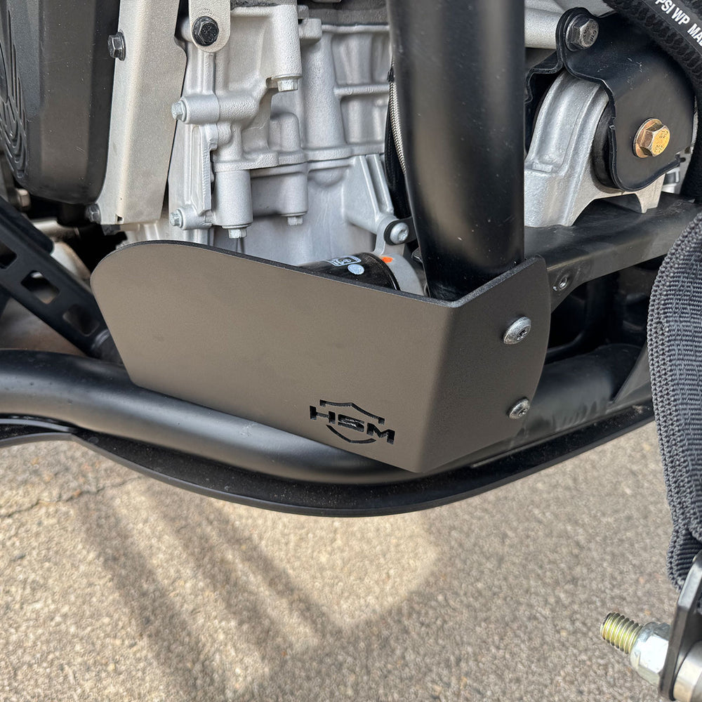 
                  
                    Installed HSM oil filter guard protecting the underside of Polaris RZR PRO R engine.
                  
                