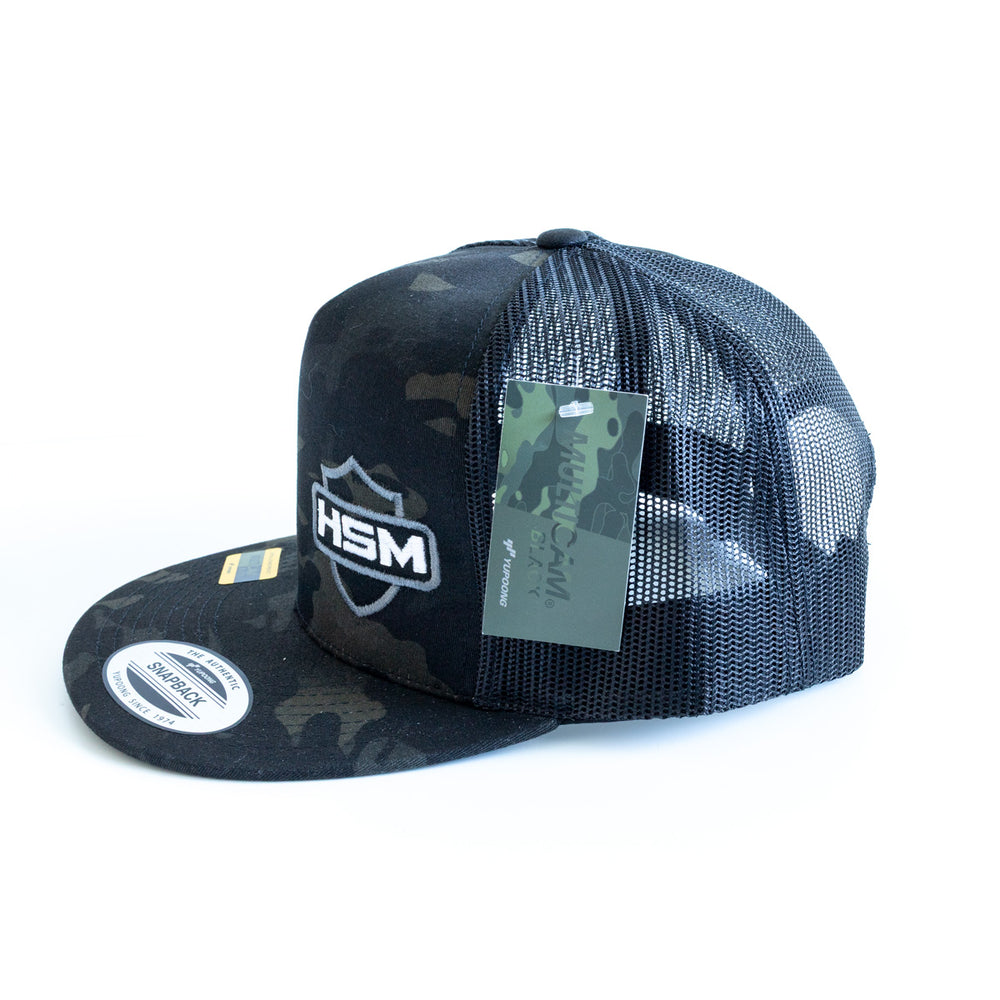 
                  
                    HSM Shield Logo Flat Brim Snapback – Black Camo
                  
                
